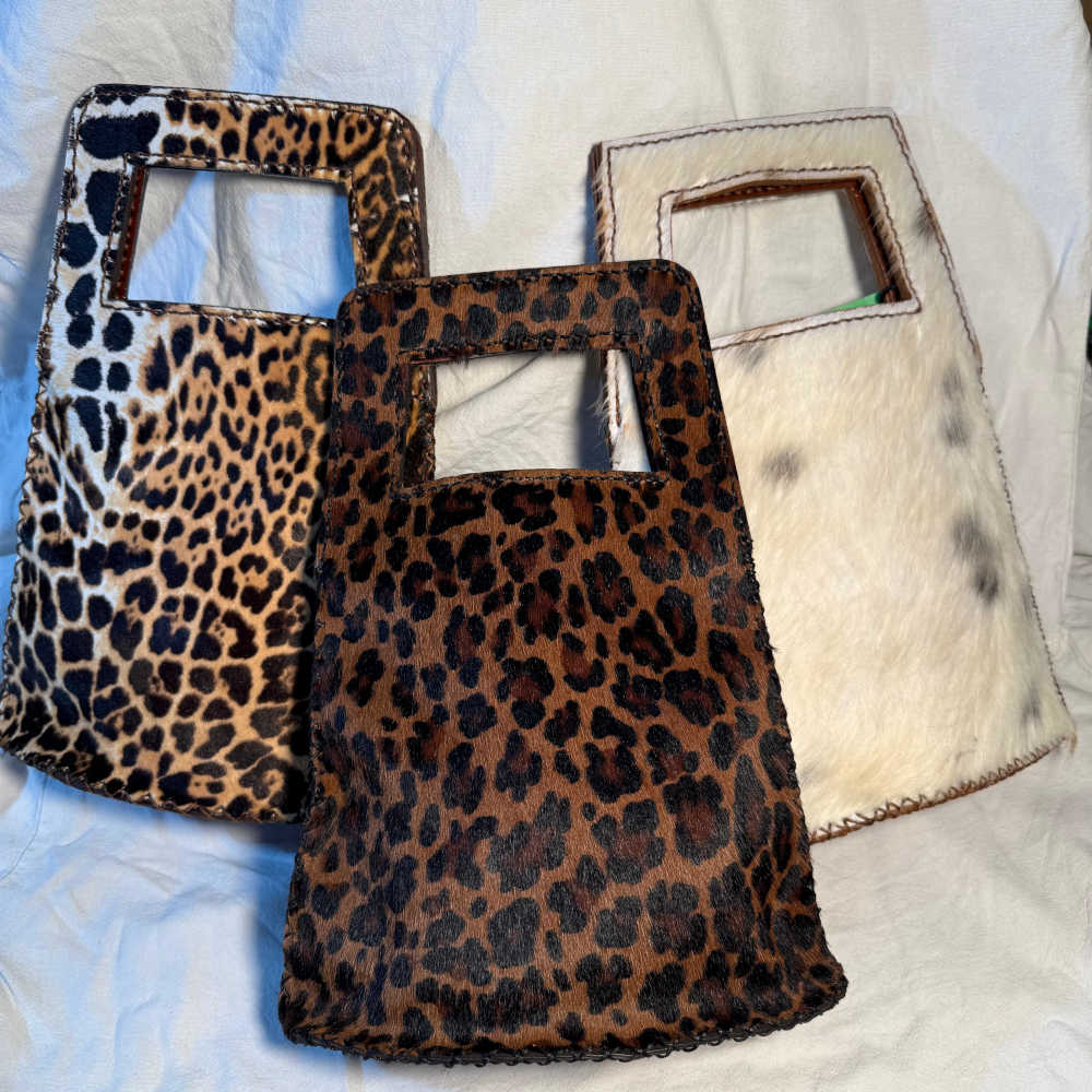 Bolso mano piel vaca tres estampados